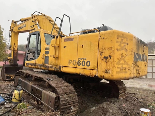 中古のKOMATSU PC600 掘削機 労働時間が少ない状態