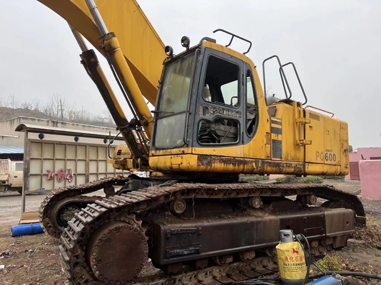 中古のKOMATSU PC600 掘削機 労働時間が少ない状態