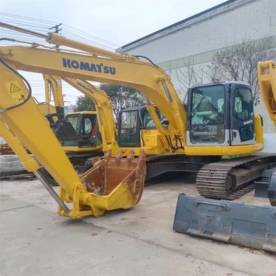 中古のコマツー PC128US 掘削機 建物の原色