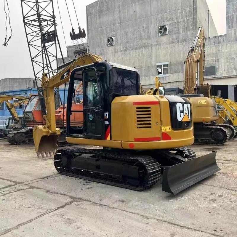 元の色でよく維持された古着キャターピラー CAT 308E 掘削機